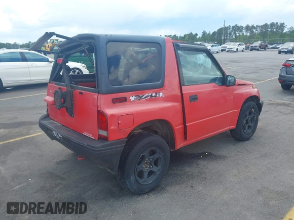 1995 Chevrolet Tracker z VIN 2CNBJ1869S6902771, wystawiony jako IAAI lot #41997456 z przebiegiem 171 629 mil mil oraz . Historia ofert i sprzedaży dostępna na DreamBid. Obrazek 4.
