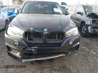 2014 BMW X5 sDrive35i with VIN 5UXKR2C50E0H31926, listed as a IAAI auction lot 41838021 with 125,813 mi miles. Bid and sale history available at carsss.com. Image 6.