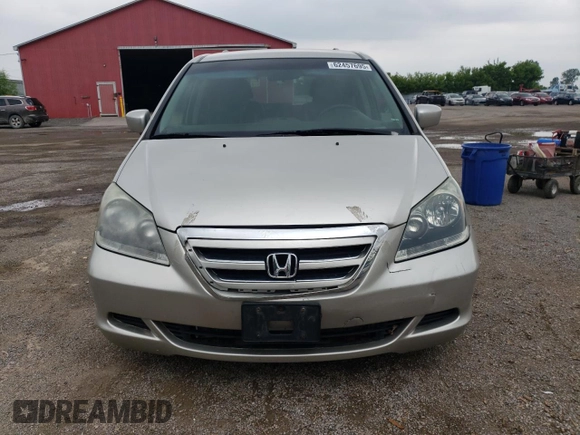 2007 Honda Odyssey EX with VIN 5FNRL38427B513477, listed as a Copart auction lot 62457695 with 216,977 mi miles and Salvage title. Bid and sale history available at DreamBid. Image 5.