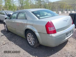 2005 Chrysler 300 with VIN 2C3AA63H65H522824, listed as a IAAI auction lot 42133787 with 266,724 mi miles. Bid and sale history available at carsss.com. Image 3.