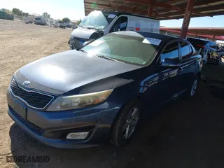 2015 Kia Optima LX with VIN 5XXGM4A71FG441715, listed as a IAAI auction lot 41871160 with 210,981 mi miles. Bid and sale history available at carsss.com. Image 17.