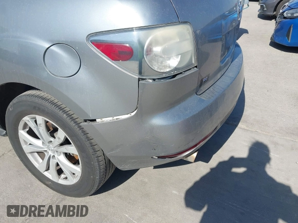 2010 Mazda CX-7 Touring z VIN JM3ER2W30A0319755, wystawiony jako IAAI lot #41786798 z przebiegiem 182 282 mil mil oraz . Historia ofert i sprzedaży dostępna na DreamBid. Obrazek 6.