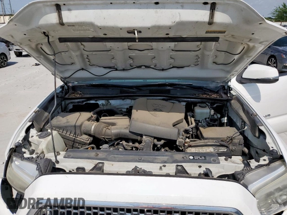 2017 Toyota Tacoma SR5 z VIN 5TFCZ5AN1HX048104, wystawiony jako Copart lot #60883165 z przebiegiem 143 856 mil mil oraz Szkoda całkowita • Salvage title. Historia ofert i sprzedaży dostępna na DreamBid. Obrazek 11.