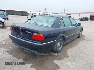 1998 BMW 7 Series 740il with VIN WBAGJ8327WDM19260, listed as a IAAI auction lot 41482326 with 1 mi miles. Bid and sale history available at carsss.com. Image 4.