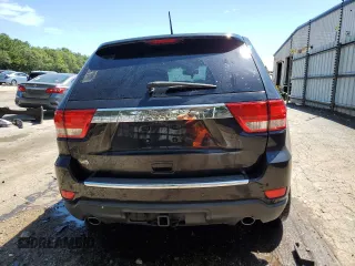 2012 Jeep Grand Cherokee Overland with VIN 1C4RJECTXCC227769, listed as a Copart auction lot 68760174 with 144,537 mi miles and Salvage Title. Bid and sale history available at carsss.com. Image 6.