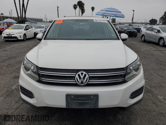 2013 Volkswagen Tiguan S with VIN WVGAV3AX9DW567289, listed as a Copart auction lot 60174115 with 157,484 mi miles and Clean title. Bid and sale history available at DreamBid. Image 5.
