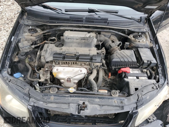 2009 Kia Spectra EX with VIN KNAFE221395026165, listed as a Copart auction lot 73715994 with 245,813 mi miles and Salvage Title. Bid and sale history available at carsss.com. Image 12.