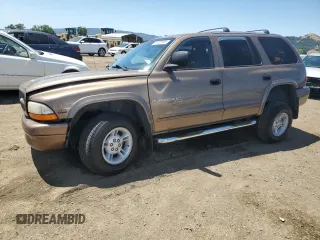2000 Dodge Durango z VIN 1B4HS28Z2YF209533, wystawiony jako Copart lot #58755995 z przebiegiem 239 809 mil mil oraz Szkoda całkowita • Salvage title. Historia ofert i sprzedaży dostępna na DreamBid. Obrazek 1.