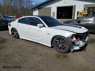 2019 Dodge Charger Scat Pack with VIN 2C3CDXGJ5KH558762, listed as a Copart auction lot 54245625 with 57,123 mi miles and Clean Title. Bid and sale history available at carsss.com. Image 4.