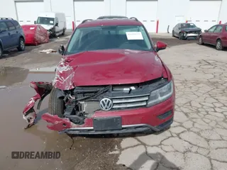 2018 Volkswagen Tiguan S with VIN 3VV1B7AX9JM085312, listed as a IAAI auction lot 41656827 with 122,322 mi miles and . Bid and sale history available at DreamBid. Image 12.