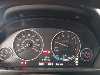 2015 BMW 3 Series 328i xDrive with VIN WBA3B5G53FNS17413, listed as a IAAI auction lot 41643479 with 99,065 mi miles. Bid and sale history available at carsss.com. Image 7.