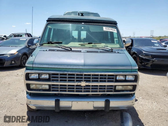 1994 Chevrolet Chevy Van z VIN 1GBEG25K9RF176079, wystawiony jako Copart lot #65824634 z przebiegiem 180 507 mil mil oraz Czysty tytuł • Clean title. Historia ofert i sprzedaży dostępna na DreamBid. Obrazek 5.