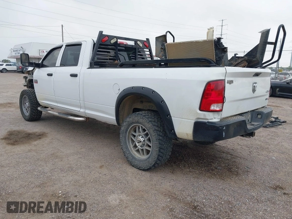 2012 Ram 2500 ST z VIN 3C6UD5HL7CG151684, wystawiony jako IAAI lot #42254751 z przebiegiem 205 423 mil mil oraz . Historia ofert i sprzedaży dostępna na DreamBid. Obrazek 3.