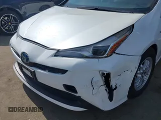2022 Toyota Prius L Eco z VIN JTDKAMFU6N3177732, wystawiony jako IAAI lot #42504790 z przebiegiem 65 338 mil mil oraz . Historia ofert i sprzedaży dostępna na DreamBid. Obrazek 6.