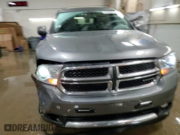 2012 Dodge Durango Crew with VIN 1C4RDJDG1CC100717, listed as a Copart auction lot 47446365 with 103,539 mi miles and Salvage Title. Bid and sale history available at carsss.com. Image 14.