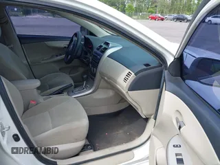 2012 Toyota Corolla L with VIN 5YFBU4EE5CP044613, listed as a IAAI auction lot 42113624 with 208,780 mi miles and . Bid and sale history available at carsss.com. Image 5.