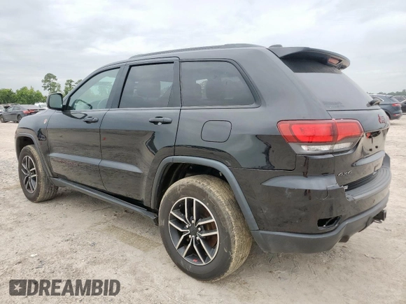 2019 Jeep Grand Cherokee Trailhawk with VIN 1C4RJFLG8KC613582, listed as a Copart auction lot 62901405 with 136,809 mi miles and Salvage title. Bid and sale history available at DreamBid. Image 2.