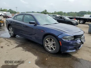 2015 Dodge Charger SXT with VIN 2C3CDXJG7FH848665, listed as a Copart auction lot 66849085 with 88,023 mi miles and Salvage title. Bid and sale history available at DreamBid. Image 4.
