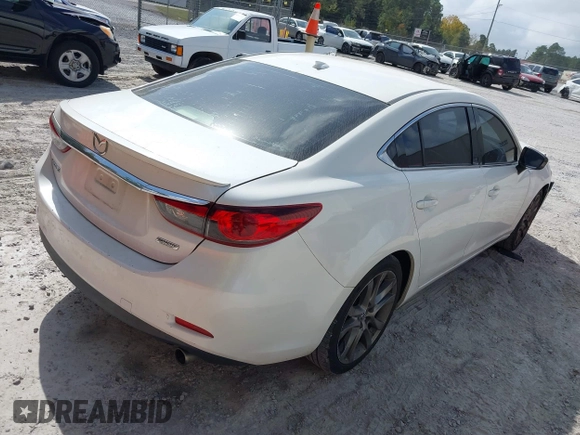 2015 Mazda 6 i Grand Touring with VIN JM1GJ1W50F1204322, listed as a IAAI auction lot 40694216 with 141,357 mi miles. Bid and sale history available at carsss.com. Image 4.