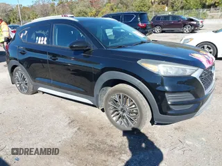 2019 Hyundai Tucson Sport with VIN KM8J33AL5KU902933, listed as a IAAI auction lot 41286316 with 73,799 mi miles. Bid and sale history available at carsss.com. Image 1.