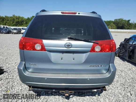 2010 Toyota Sienna XLE with VIN 5TDYK4CC1AS325572, listed as a Copart auction lot 53334805 with 100,426 mi miles and Salvage Title. Bid and sale history available at carsss.com. Image 6.