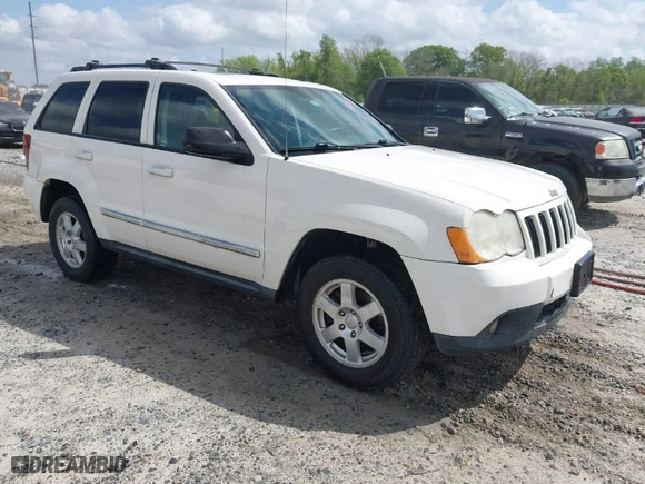 2010 Jeep Grand Cherokee Laredo with VIN 1J4PR4GK0AC151711, listed as a IAAI auction lot 41940295 with 185,684 mi miles. Bid and sale history available at carsss.com. Image 1.