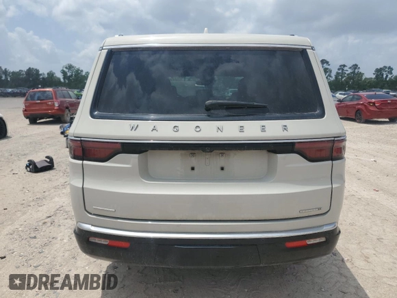 2022 Jeep Wagoneer Series III with VIN 1C4SJVDT9NS212446, listed as a Copart auction lot 55009165 with 61,788 mi miles and Salvage Title. Bid and sale history available at DreamBid. Image 6.