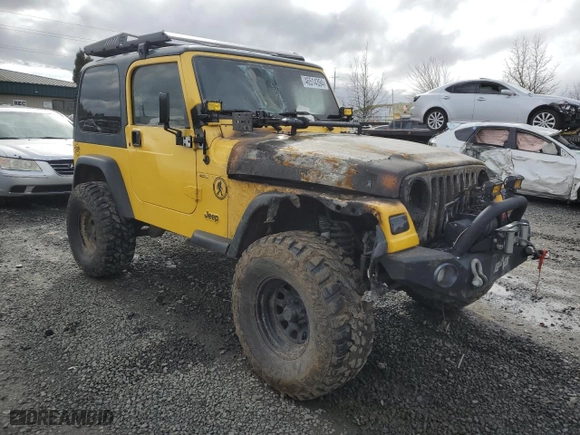 2000 Jeep Wrangler Sport with VIN 1J4FA49S3YP747043, listed as a Copart auction lot 46514394 with 0 mi miles and Salvage Title. Bid and sale history available at carsss.com. Image 4.