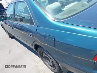 1998 Toyota Camry LE z VIN 4T1BF22K1WU927328, wystawiony jako IAAI lot #42534974 z przebiegiem 74 368 mil mil oraz . Historia ofert i sprzedaży dostępna na DreamBid. Obrazek 16.