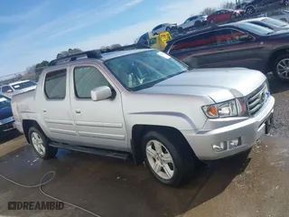 2014 Honda Ridgeline RTL with VIN 5FPYK1F51EB012843, listed as a IAAI auction lot 41629002 with 114,761 mi miles. Bid and sale history available at carsss.com. Image 13.