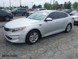 2016 Kia Optima LX with VIN KNAGT4L3XG5111796, listed as a IAAI auction lot 42106116 with 138,184 mi miles. Bid and sale history available at carsss.com. Image 2.