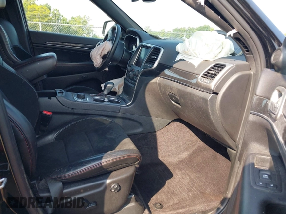 2018 Jeep Grand Cherokee Trailhawk with VIN 1C4RJFLG4JC241057, listed as a IAAI auction lot 42416590 with 81,822 mi miles and . Bid and sale history available at DreamBid. Image 5.
