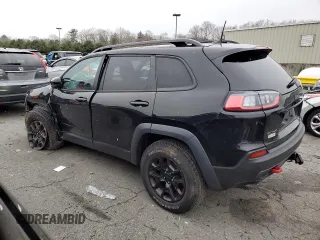 2022 Jeep Cherokee Trailhawk with VIN 1C4PJMBX3ND502322, listed as a Copart auction lot 85561444 with 57,630 mi miles and Salvage Title. Bid and sale history available at carsss.com. Image 2.