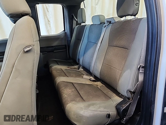 2019 Ford F-150 XL with VIN 1FTEX1E55KKC02870, listed as a IAAI auction lot 42631387 with 206,967 mi miles and . Bid and sale history available at DreamBid. Image 32.