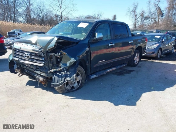 2007 Toyota Tundra LTD with VIN 5TBDV58167S464519, listed as a IAAI auction lot 41569216 with 311,460 mi miles. Bid and sale history available at carsss.com. Image 2.