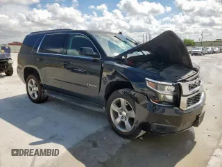 2015 Chevrolet Tahoe LT with VIN 1GNSCBKC1FR136202, listed as a Copart auction lot 62408595 with 117,869 mi miles and Salvage title. Bid and sale history available at DreamBid. Image 4.