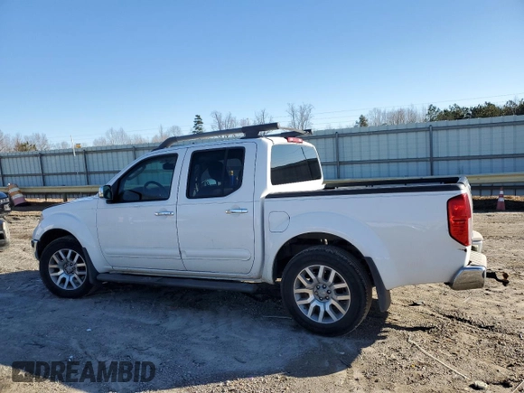 2010 Nissan Frontier LE with VIN 1N6AD0EV5AC407077, listed as a Copart auction lot 44103215 with 224,351 mi miles and Salvage title. Bid and sale history available at DreamBid. Image 2.