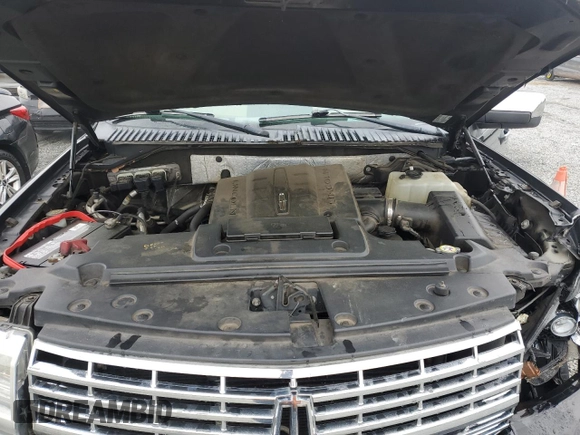 2011 Lincoln Navigator with VIN 5LMJJ2J5XBEJ04548, listed as a Copart auction lot 52440525 with 266,999 mi miles and Salvage title. Bid and sale history available at DreamBid. Image 12.