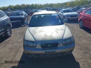 2003 Hyundai Elantra GLS z VIN KMHDN45D93U495703, wystawiony jako IAAI lot #42137927 z przebiegiem 93 287 mil mil oraz . Historia ofert i sprzedaży dostępna na DreamBid. Obrazek 12.