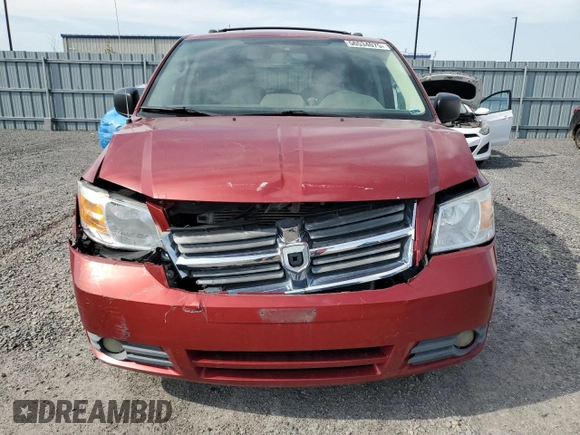 2008 Dodge Grand Caravan z VIN 2D8HN44P98R667431, wystawiony jako Copart lot #56534075 z przebiegiem 176 208 mil mil oraz Szkoda całkowita • Salvage title. Historia ofert i sprzedaży dostępna na DreamBid. Obrazek 5.