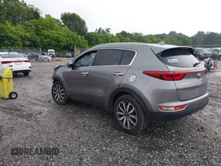 2018 Kia Sportage EX with VIN KNDPN3AC0J7310720, listed as a IAAI auction lot 42400165 with 118,929 mi miles and . Bid and sale history available at DreamBid. Image 3.