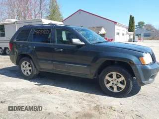 2008 Jeep Grand Cherokee Laredo with VIN 1J8GR48K98C161239, listed as a IAAI auction lot 42090850 with 218,063 mi miles. Bid and sale history available at carsss.com. Image 14.