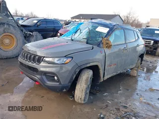 2023 Jeep Compass Trailhawk with VIN 3C4NJDDN9PT559799, listed as a IAAI auction lot 41636007 with 11,445 mi miles and . Bid and sale history available at DreamBid. Image 2.