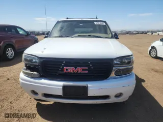 2004 GMC Yukon XL Denali with VIN 1GKFK66U44J258379, listed as a Copart auction lot 52974945 with 167,524 mi miles and Salvage Title. Bid and sale history available at carsss.com. Image 5.