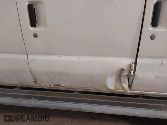2013 Ford Econoline Cargo Commercial with VIN 1FTNE2EW0DDA16097, listed as a IAAI auction lot 42172617 with 369,619 mi miles and . Bid and sale history available at DreamBid. Image 6.