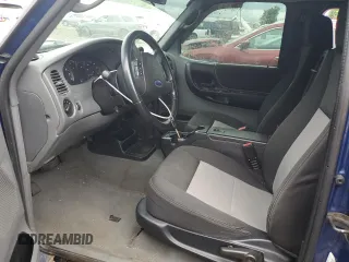 2007 Ford Ranger XLT z VIN 1FTZR45E77PA92881, wystawiony jako Copart lot #57588485 z przebiegiem Nie podano mil oraz Szkoda całkowita • Salvage title. Historia ofert i sprzedaży dostępna na DreamBid. Obrazek 7.