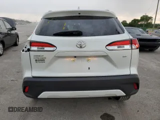 2024 Toyota Corolla Cross LE z VIN 7MUCAAAG2RV100676, wystawiony jako Copart lot #56000675 z przebiegiem 12 471 mil mil oraz Tytuł czysty. Historia ofert i sprzedaży dostępna na DreamBid. Obrazek 6.