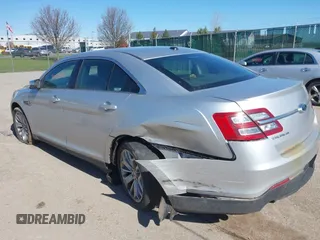 2013 Ford Taurus Limited z VIN 1FAHP2F85DG114828, wystawiony jako IAAI lot #42043885 z przebiegiem 166 786 mil mil oraz . Historia ofert i sprzedaży dostępna na DreamBid. Obrazek 3.