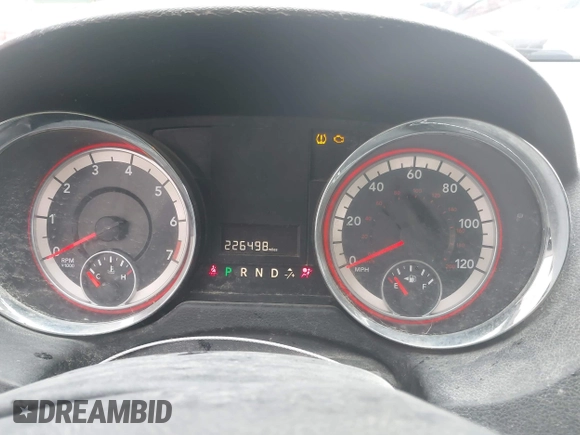 2013 Dodge Grand Caravan SE with VIN 2C4RDGBG2DR773577, listed as a IAAI auction lot 41823951 with 226,498 mi miles and . Bid and sale history available at DreamBid. Image 7.