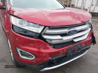 2015 Ford Edge Titanium z VIN 2FMTK4K94FBB69970, wystawiony jako IAAI lot #41982057 z przebiegiem 97 422 mil mil oraz . Historia ofert i sprzedaży dostępna na DreamBid. Obrazek 6.